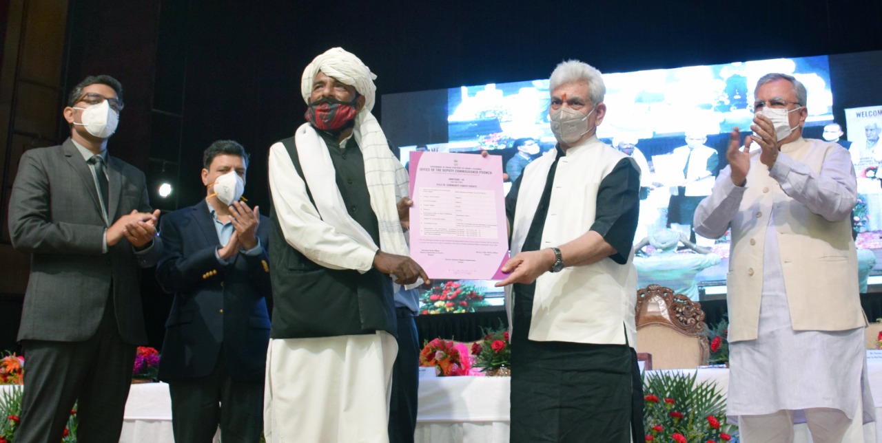 LG Sinha hands over Forest rights certificates to tribals